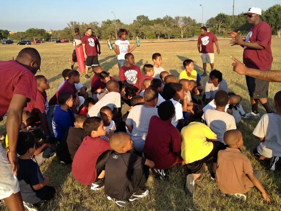 Team huddle with coaches
